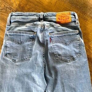 Levi 725 High Rise Bootcut jeans, size 27x31, wore 1x before outgrowing.